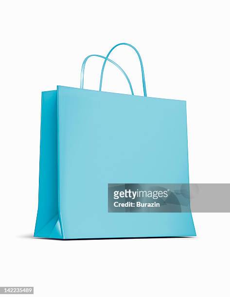 blue shopping bag - bolsa de papel fotografías e imágenes de stock