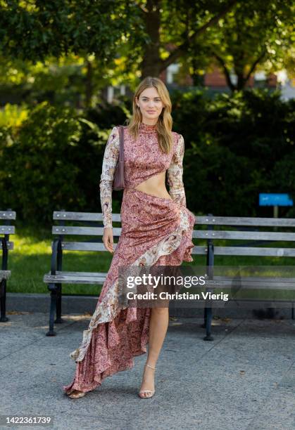 Guest is seen wearing cut out ruffled dress outside Bronx & Banco on September 09, 2022 in New York City.