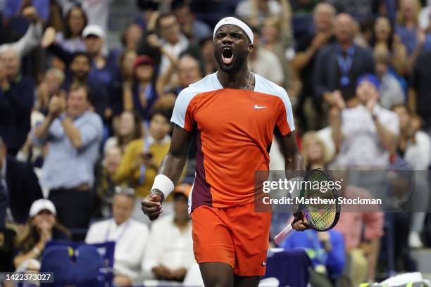 Frances Tiafoe of the United States celebrates a break point against Carlos Alcaraz of Spain during their Men’s Singles Semifinal match on Day Twelve...