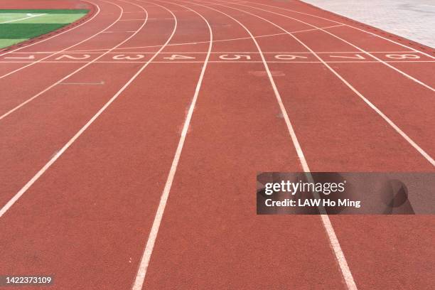 full frame shot of running track - track and field event stock pictures, royalty-free photos & images