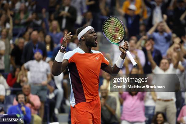 Frances Tiafoe of the United States celebrates a break point against Carlos Alcaraz of Spain during their Men’s Singles Semifinal match on Day Twelve...