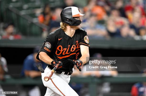 Gunnar Henderson of the Baltimore Orioles hits a double in the ninth inning against the Boston Red Sox at Oriole Park at Camden Yards on September...