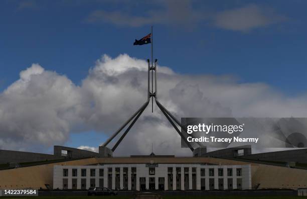 Australian flags fly at half mast at the Australian Parliament House on September 10, 2022 in Canberra, Australia. Queen Elizabeth II died at...