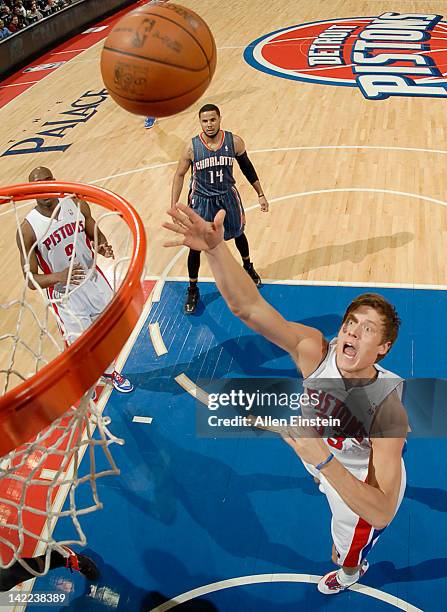 Jonas Jerebko of the Detroit Pistons sends the ball to the basket during the game between the Detroit Pistons and the Charlotte Bobcats on March 31,...