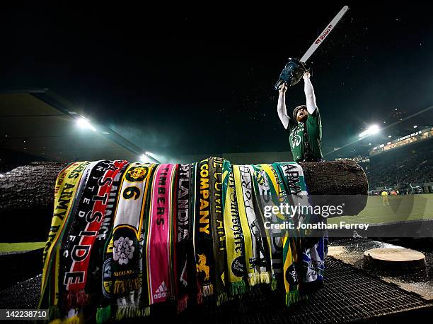 Timber Joey of the Portland Timbers raised his chainsaw in the air after sawing a log after a goal against Real Salt Lake at Jeld-Wen Field on March...