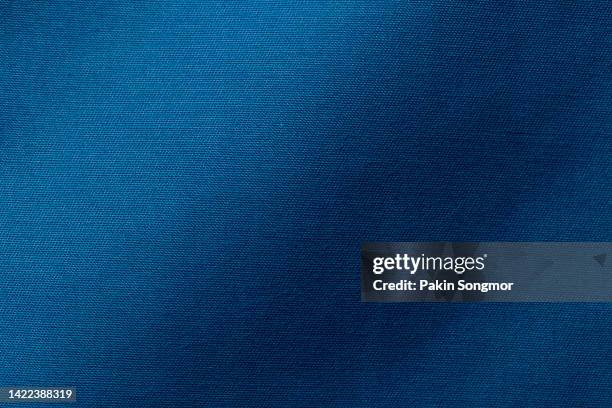 blue color fabric cloth polyester texture and textile background. - polyester stock pictures, royalty-free photos & images