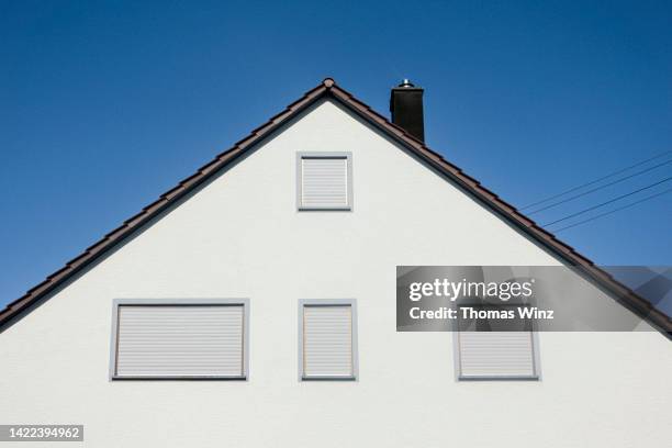 four windows and a pointed roof - pointy architecture stock pictures, royalty-free photos & images