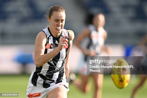 Jordyn Allen of the Magpies chases after the ball during the round three AFLW match between the Geelong Cats and the Collingwood Magpies at GMHBA...