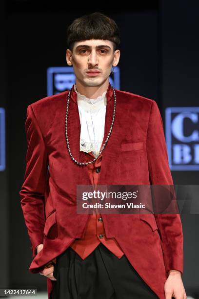 Model walks the runway wearing Carlos Benguigui during NYFW hiTechMODA Season 8 at The Edison Ballroom on September 9, 2022 in New York City.