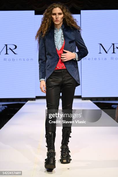 Model walks the runway wearing Carlos Benguigui during NYFW hiTechMODA Season 8 at The Edison Ballroom on September 9, 2022 in New York City.