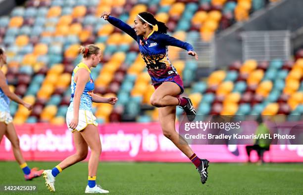 Zimmorlei Farquharson of the Lions celebrates after kicking a goal during the round three AFLW match between the Brisbane Lions and the Gold Coast...