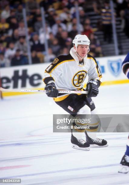 Joe Mullen of the Boston Bruins skates on the ice during an NHL game against the Washington Capitals on March 2, 1996 at the FleetCenter in Boston,...