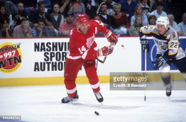 Brendan Shanahan of the Detroit Red Wings skates with the puck during an NHL game against the Nashville Predators circa 2000 at the Gaylord...