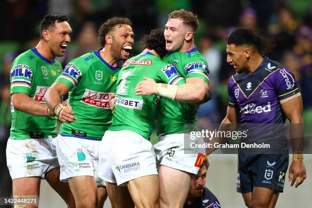 Hudson Young of the Raiders celebrates with team mates after scoring a try during the NRL Elimination Final match between the Melbourne Storm and the...
