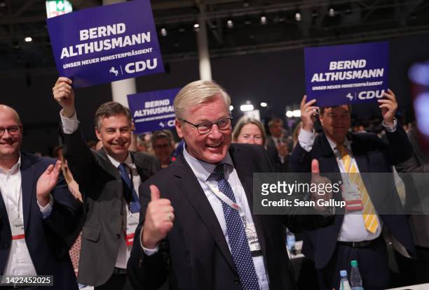 Bernd Althusmann, leader of the German Christian Democrats in the state of Lower Saxony, stands among applauding delegates after he spoke on the...