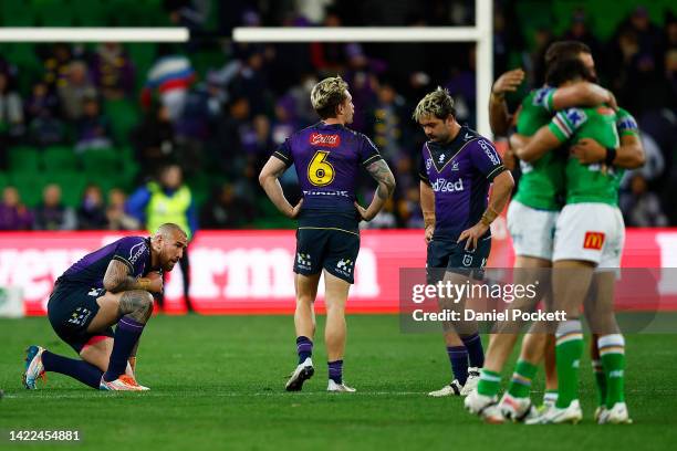 Nelson Asofa-Solomona of the Storm , Cameron Munster of the Storm and Brandon Smith of the Storm look dejected after the NRL Elimination Final match...