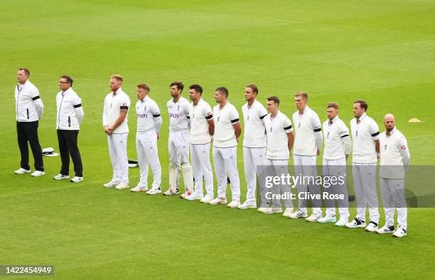 England players line up whilst wearing black armbands as a tribute to Her Majesty Queen Elizabeth II prior to Day Three of the Third LV= Insurance...
