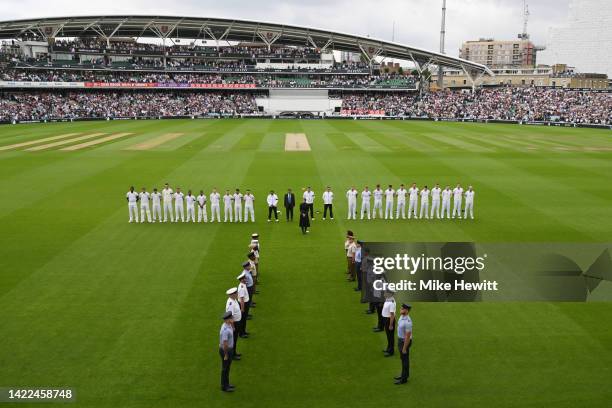 England and South Africa players hold a minutes silence as a tribute to Her Majesty Queen Elizabeth II prior to Day Three of the Third LV= Insurance...