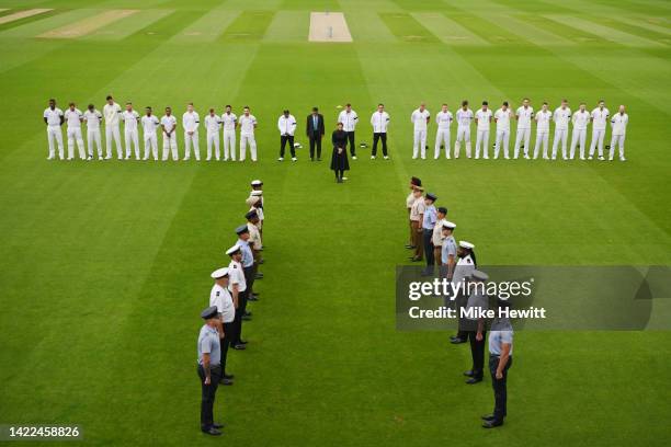 England and South Africa players hold a minutes silence as a tribute to Her Majesty Queen Elizabeth II prior to Day Three of the Third LV= Insurance...