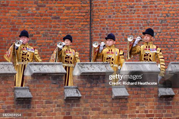 State Trumpeters from the Band of the Household Cavalry perform as David Vines White, Garter King of Arms reads the Principal Proclamation, from the...