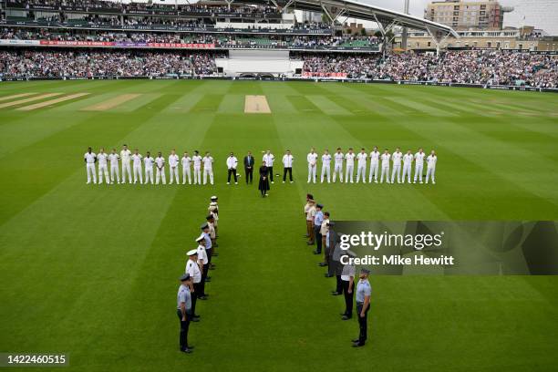 England and South Africa players hold a minutes silence as a tribute to Her Majesty Queen Elizabeth II prior to Day Three of the Third LV= Insurance...