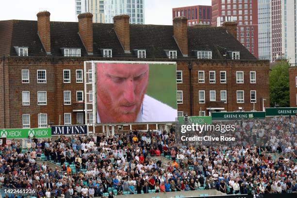 Fans observe a minutes silence as a tribute to Her Majesty Queen Elizabeth II prior to Day Three of the Third LV= Insurance Test Match between...