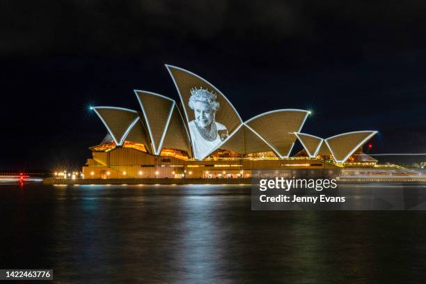 An image of the late Queen Elizabeth II is projected onto the sails of the Sydney Opera House on September 10, 2022 in Sydney, Australia. Queen...