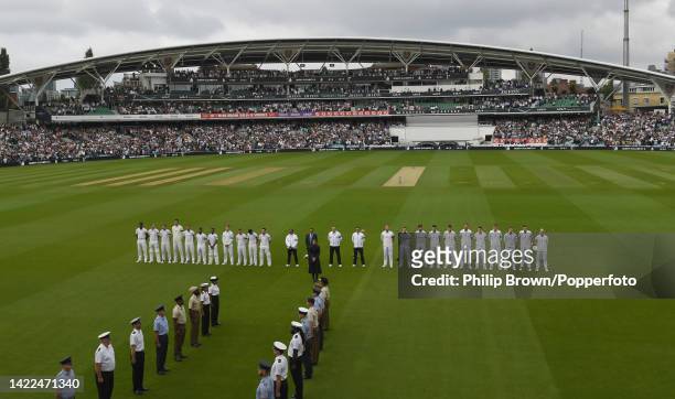 The South Africa with captain Dean Elgar and The England team with captain Ben Stokes observe a minute of silence before the third day of the third...