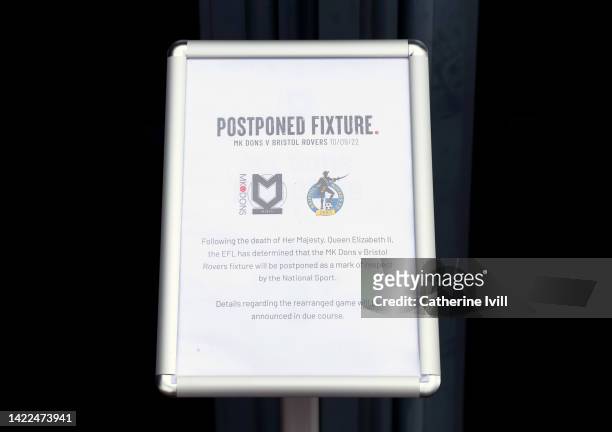 Notice outside Stadium MK announcing the postponement of today's fixture with Bristol Rovers by the EFL as a mark of respect following the death of...