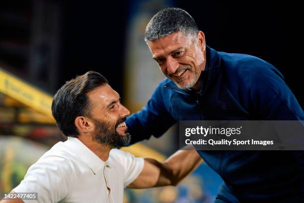 Xavier Garcia Pimienta, head coach of UD Las Palmas with Eder Sarabia, head coach of FC Andorra during the La Liga Smartbank match between UD Las...