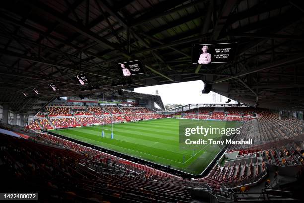 General view as an LED board inside the stadium displays a tribute to Her Majesty Queen Elizabeth II who died at Balmoral Castle on September 8, 2022...