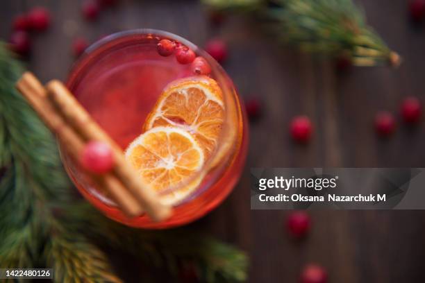 winter red hot drink with spices - cocktail recipe stock pictures, royalty-free photos & images