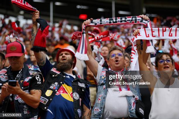 Fans of RB Leipzig enjoy the pre match atmosphere prior to the Bundesliga match between RB Leipzig and Borussia Dortmund at Red Bull Arena on...