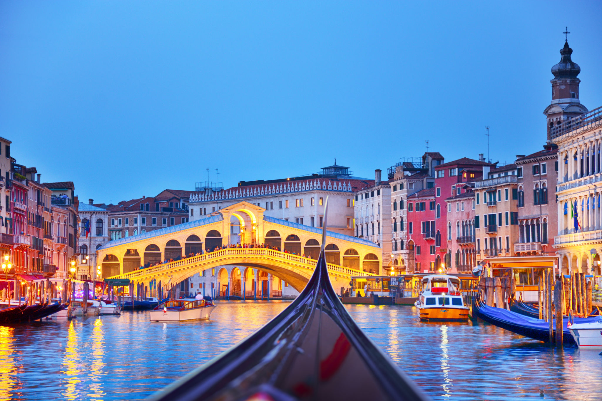 Rialto Bridge at sunset in Venice, Italy Rialto Bridge at sunset in Venice, Italy