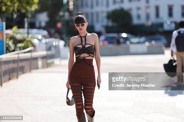 Kaya Tolstova seen wearing a bronx and banco look and a Gucci bag, outside Bronx and Banco Show during New York Fashion Week on September 09, 2022 in...