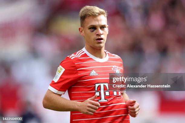 Joshua Kimmich of FC Bayern Munich is seen with a bruise around the eye during the Bundesliga match between FC Bayern Muenchen and VfB Stuttgart at...