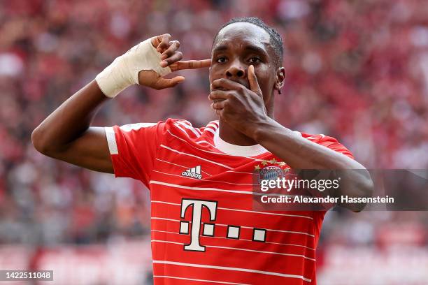 Mathys Tel of Bayern Munich celebrates after scoring their team's first goal during the Bundesliga match between FC Bayern Muenchen and VfB Stuttgart...