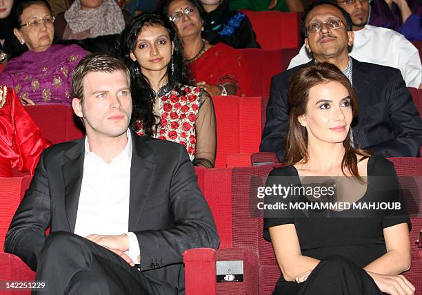 Actors of the popular Turkish soap opera "Nour" Kivanc Tatlitug and Songul Oden attend the closing ceremony of the 7th Muscat International Film...