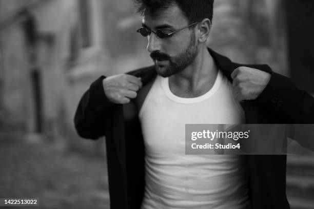 black and white fashionable man - runaway groom stock pictures, royalty-free photos & images