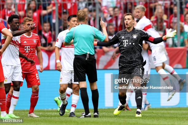 Manuel Neuer of Bayern Munich appeals to referee Christian Dingert after Sehrou Guirassy of VfB Stuttgart scores a goal which is disallowed by VAR...