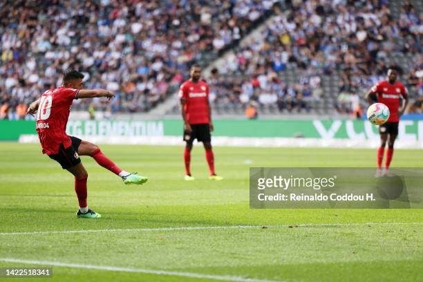 Kerem Demirbay of Bayer Leverkusen scores their team's first goal from a free kick during the Bundesliga match between Hertha BSC and Bayer 04...
