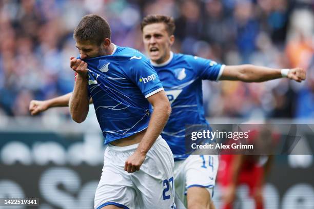 Andrej Kramaric of TSG Hoffenheim celebrates after scoring their team's first goal during the Bundesliga match between TSG Hoffenheim and 1. FSV...