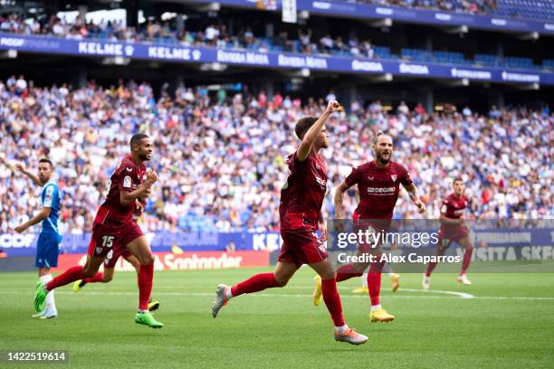 Jose Angel Carmona of Sevilla FC celebrates after scoring his team's second goal during the LaLiga Santander match between RCD Espanyol and Sevilla...