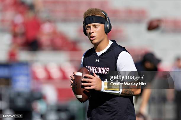 Spencer Rattler of the South Carolina Gamecocks warms up before a game against the Arkansas Razorbacks at Donald W. Reynolds Razorback Stadium on...