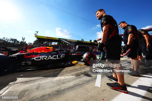 Sergio Perez of Mexico driving the Oracle Red Bull Racing RB18 stops in the Pitlane during qualifying ahead of the F1 Grand Prix of Italy at...