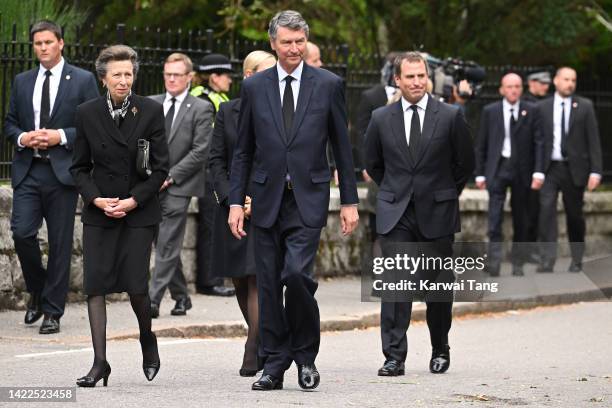 Anne, Princess Royal, Timothy Laurence and Peter Phillips depart Balmoral Castle for a church service at Crathie Kirk on September 10, 2022 in...