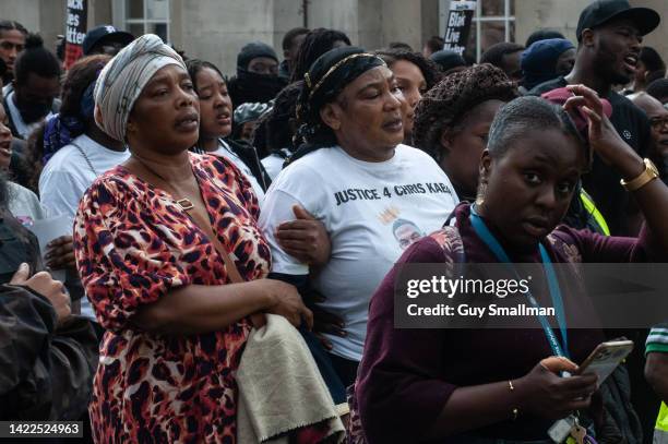 Family members of Chris Kaba join demonstrators as they march down Whitehall to Scotland Yard to protest the killing of Chris Kaba on September 10,...