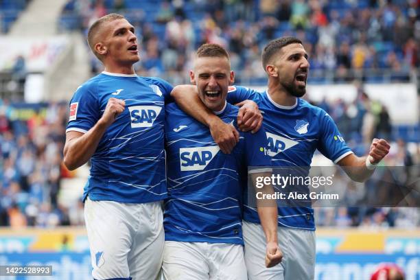 Pavel Kaderabek of TSG Hoffenheim celebrates with teammates after scoring their team's fourth goal during the Bundesliga match between TSG Hoffenheim...