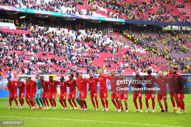 Leipzig players celebrate victory following the Bundesliga match between RB Leipzig and Borussia Dortmund at Red Bull Arena on September 10, 2022 in...