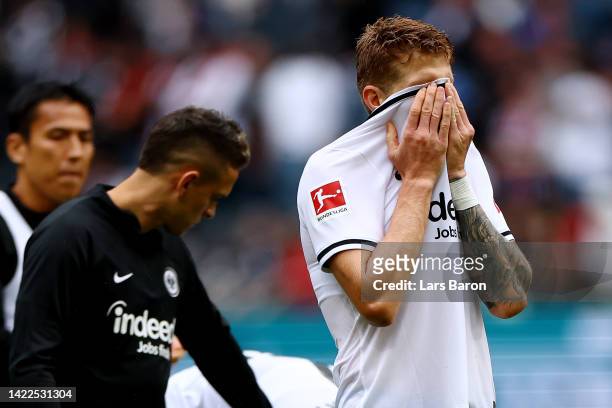 Kristijan Jakic of Eintracht Frankfurt looks dejected following their sides defeat in the Bundesliga match between Eintracht Frankfurt and VfL...
